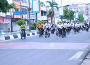 Waka Polres  Gowes Bareng Rektor ULB Di Dies Natalis ke-27 ULB