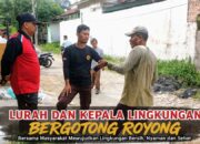 “Lurah Bakaran Batu Sukri Alam Siregar Turun Langsung Bersihkan Parit, Ajak Warga Gotong Royong”